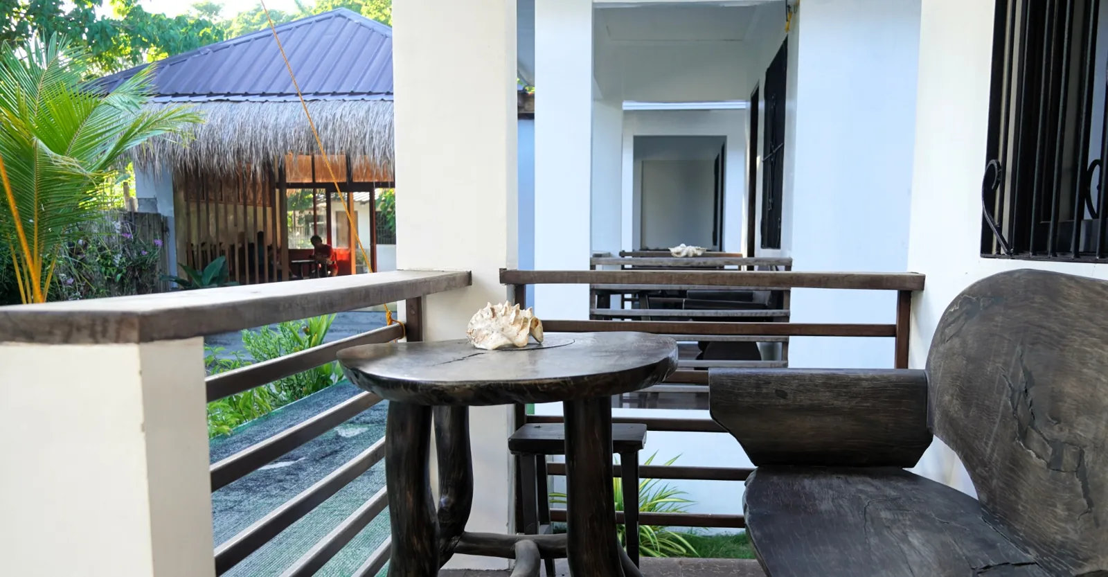 Private terrace seating outside a Double Room with Terrace.