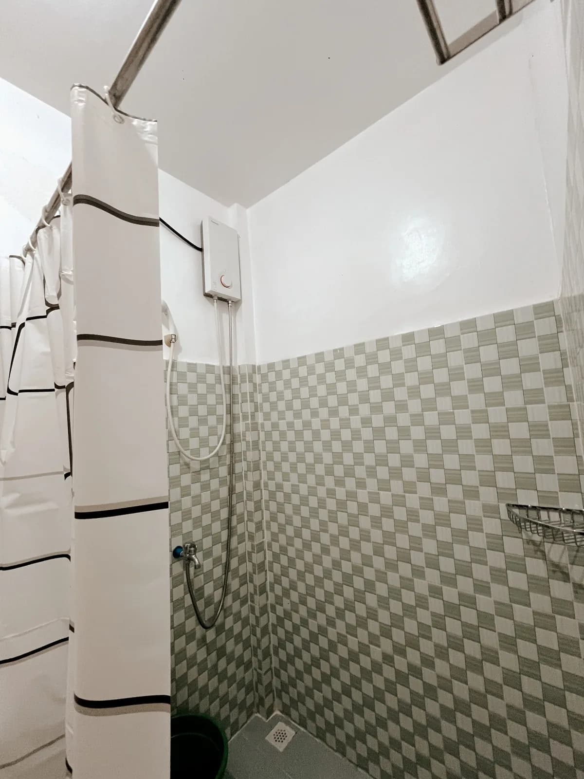Private bathroom in the Standard Room with hot shower area.